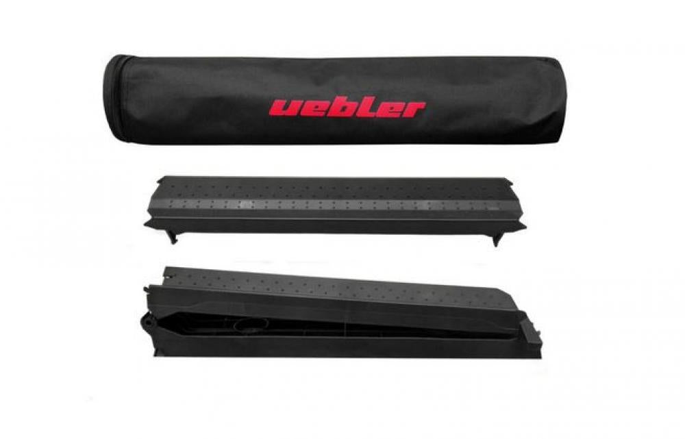Uebler Auffahrschiene 19950 mit Überfahrschiene für i- und F-Serie, faltbar, inklusive Tasche mit rotem Logo.