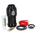 RockShox Air Can Upgrade Kit mit schwarzer Luftkammer, Dichtungen (rot, schwarz, weiß), Schmierfett und Öl.