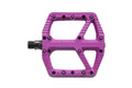 Lila SDG Comp Plattform-Pedal für Fahrräder. Detailaufnahme des Pedals mit sichtbaren Pins auf weißem Hintergrund.