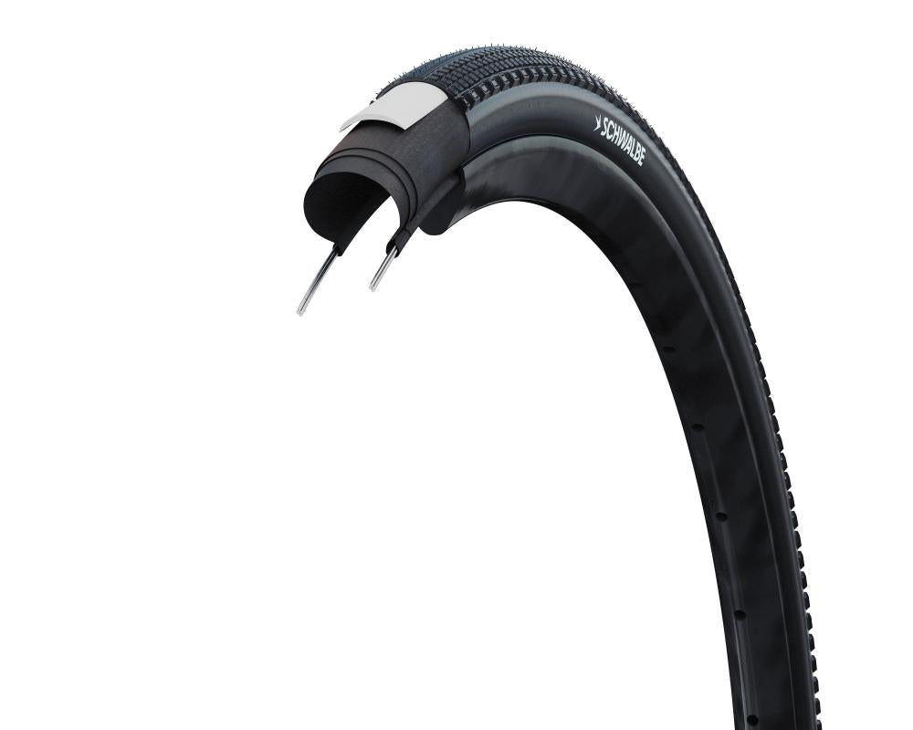 Schwalbe G-ONE COMP PLUS 29 Zoll Gravelreifen Schwarz: Querschnitt mit ActPunctureGuard Pannenschutz.