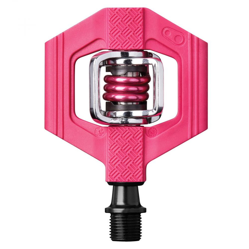 Leuchtend pinkes Crankbrothers Candy 1 Klick-Pedal für Mountainbikes, mit sichtbarem Feder-Mechanismus.