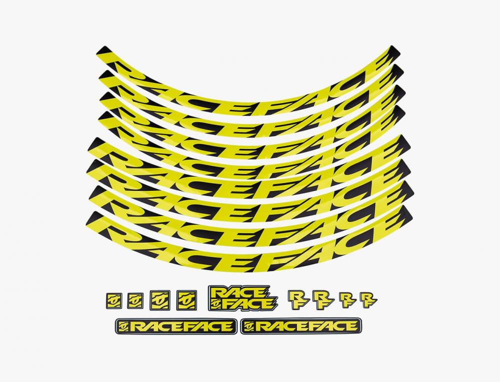 Race Face Laufrad Decal Set in Neongelb für Fahrräder, mit großen und kleinen Aufklebern.