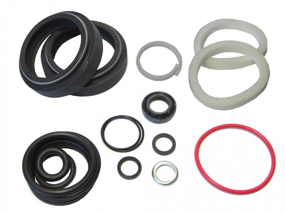 RockShox Pike DJ A1 Federgabel Service-Kit Basic, zeigt verschiedene schwarze Dichtungen, O-Ringe und weiße Schaumringe.