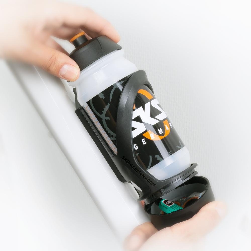 SKS Flaschenhalter Spacecage - Trinkflaschenhalter mit integriertem Stauraum - Leicht & robust - Passend für Standardflaschen - Schwarz