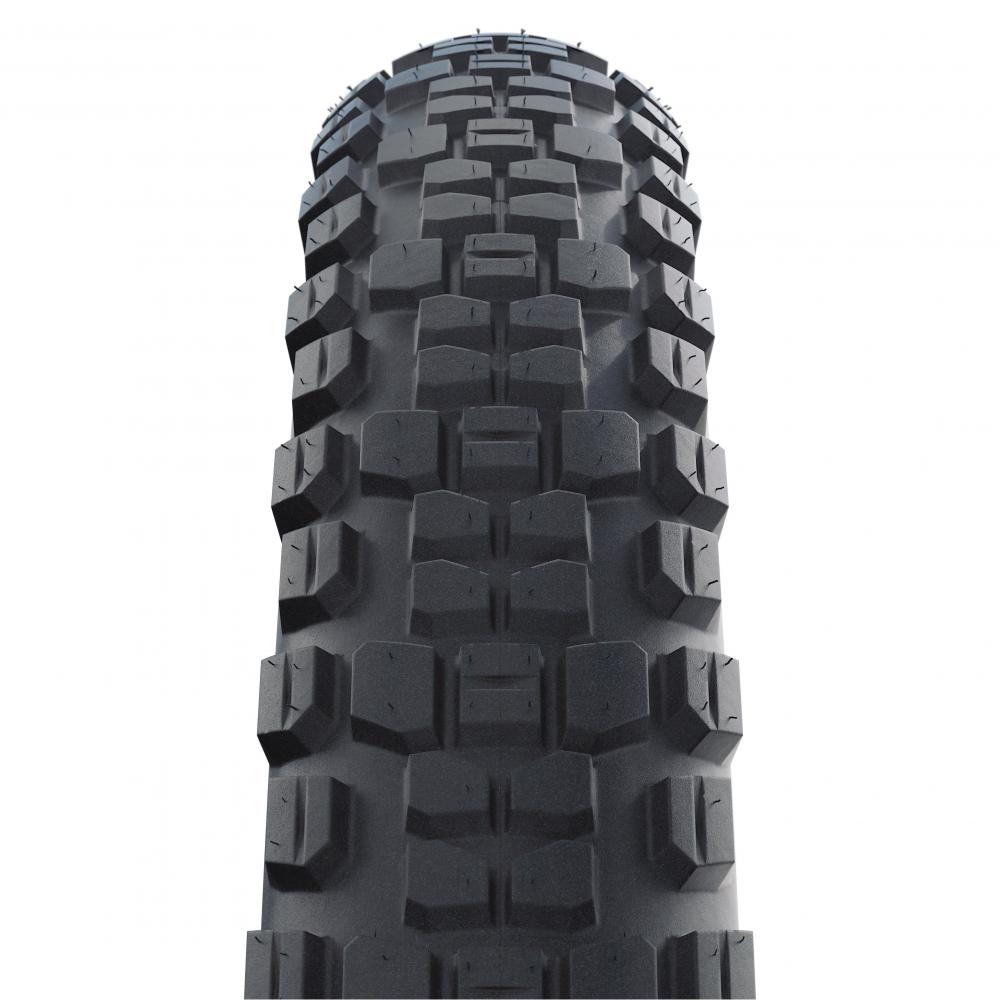 Schwalbe Johnny Watts E-Bike Faltreifen 27.5x2.80" schwarz, detailliertes Stollenprofil von vorne.