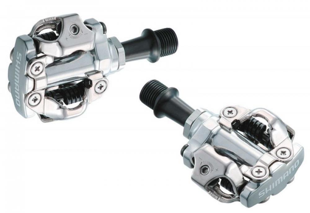 Zwei silberne SHIMANO PD-M540 Klickpedale mit offener Konstruktion für Mountainbike und Geländeeinsatz.