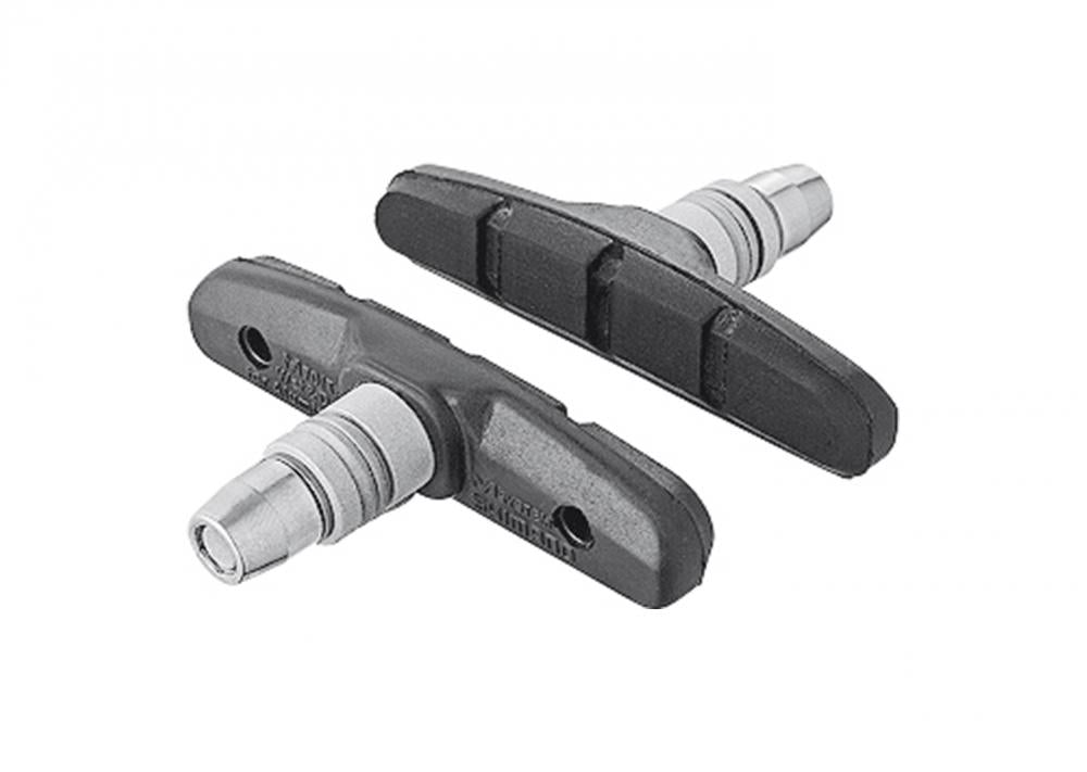 Zwei schwarze Shimano M70T4 Bremsschuhe 90 mm für zuverlässige Bremsleistung bei Nässe und Trockenheit.