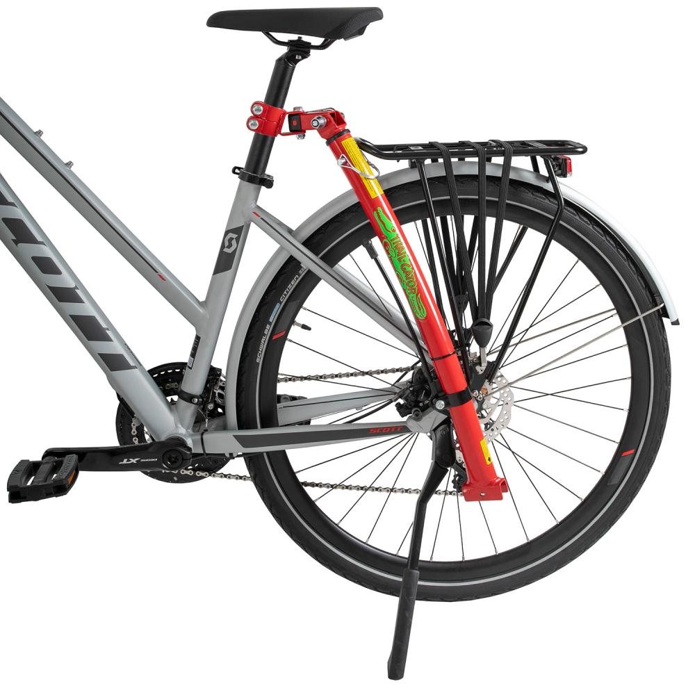Rote Trail-Gator Tandemstange am grauen Fahrrad montiert, faltbar, werkzeuglos, TÜV/GS-geprüft.