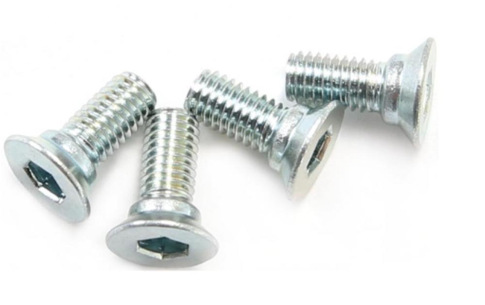 Vier silberne Shimano SPD Cleat Schrauben SM-SH51/56, Senkkopf und Innensechskantantrieb.
