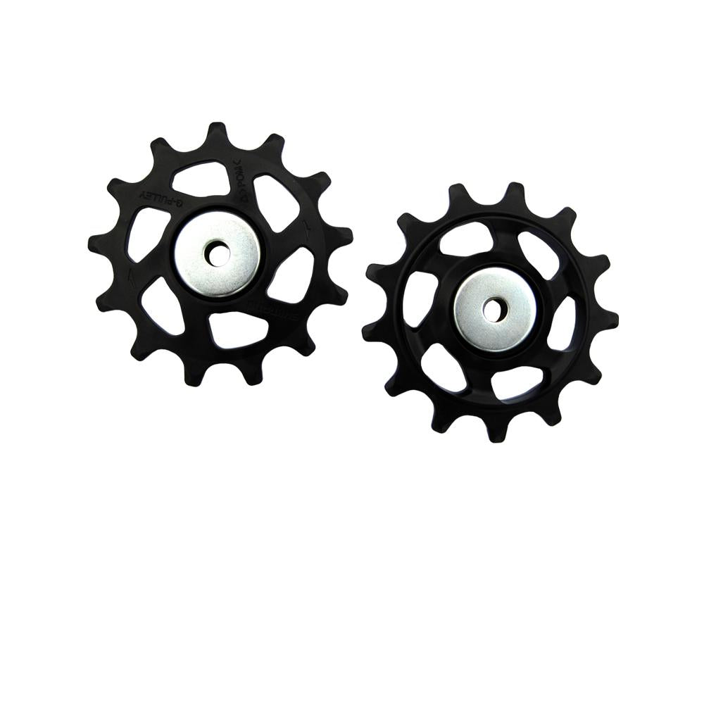 SHIMANO XT RD-M8100 Schaltrollensatz, zwei schwarze Fahrrad-Schaltrollen mit silbernen Lagern für Schaltwerke.