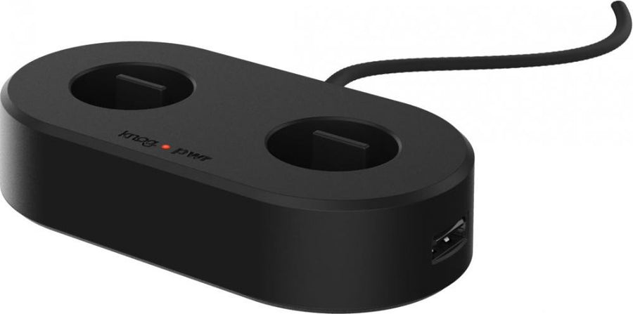 Knog PWR Dock Aufladestation schwarz mit zwei Ladeschächten und USB-Anschluss für Fahrradbeleuchtung.