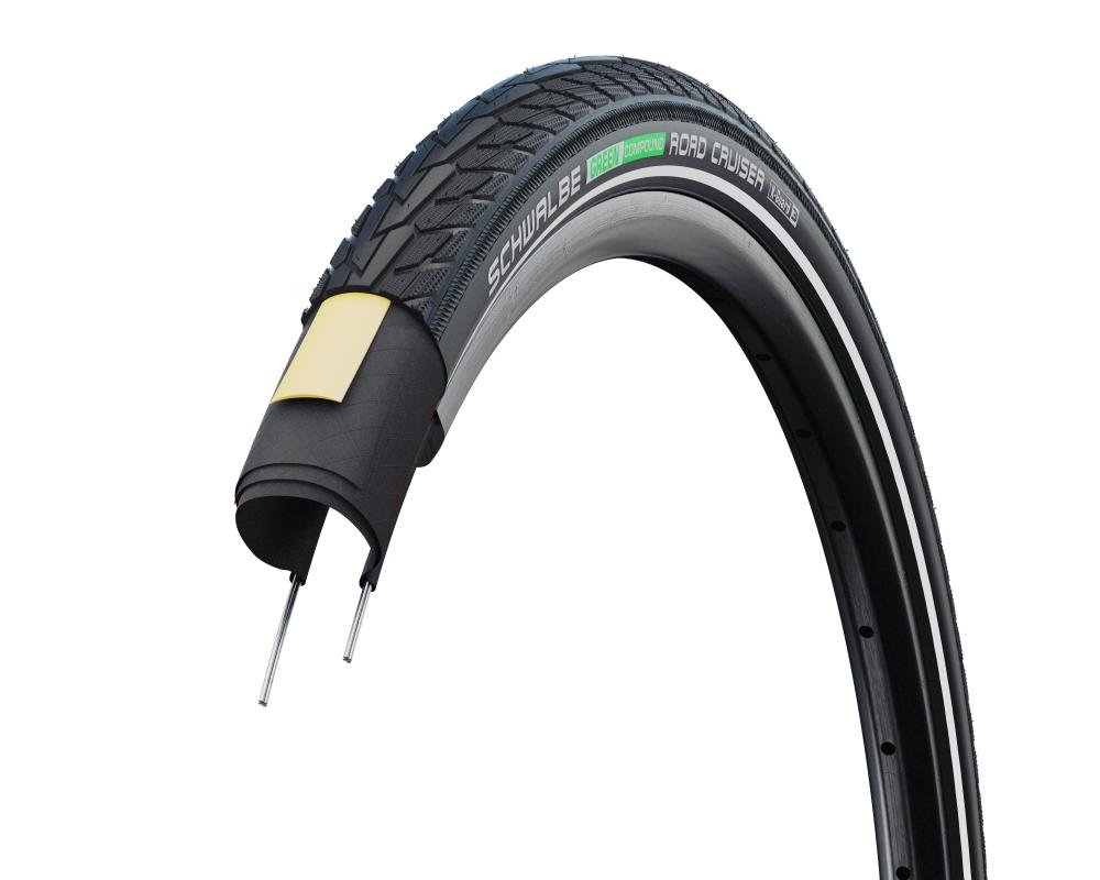 Schwalbe Road Cruiser 28x1.40 700x35C Drahtreifen mit Green Compound und K-Guard Pannenschutz im Querschnitt auf Felge.