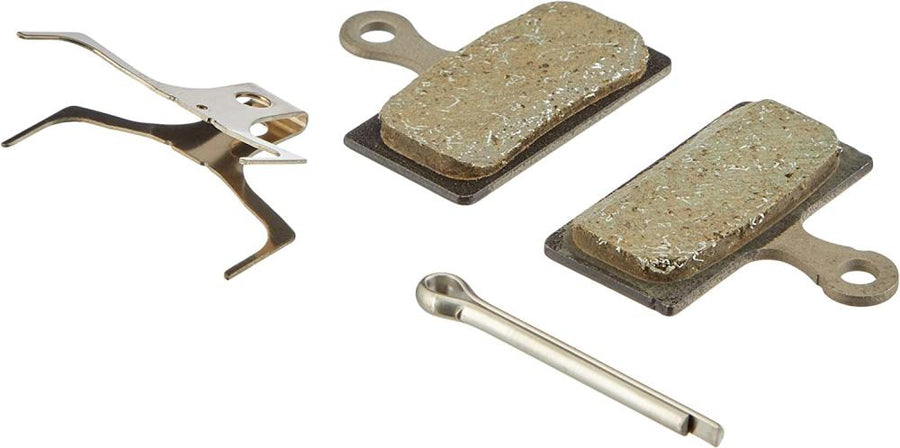 Set Shimano G05S-RX Resin Scheibenbremsbeläge mit Feder und Splint für leise, verschleißfeste und leistungsstarke Bremsen.