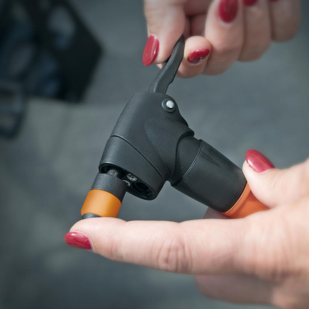 SKS Clik-Valve Adapter, schwarz-orange, für einfachen und sicheren Ventilwechsel an SKS Fahrradpumpen.