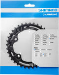 SHIMANO Kettenblatt DEORE FC-M4100 36 Zähne für präzisen MTB-Antrieb, schwarz, in blau-weißer Verpackung.