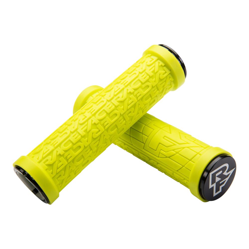Gelbe Race Face Grippler Lock-On Fahrradgriffe mit RACEFACE-Schriftzug und Logo für sicheren Halt und modernes Design.