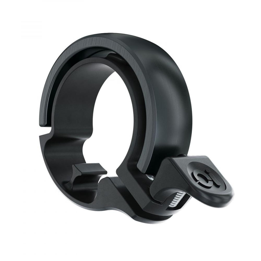 Schwarze Knog Oi Classic Large Fahrradklingel für 23,8 bis 31,8 mm Lenker im minimalistischen Ring-Design.