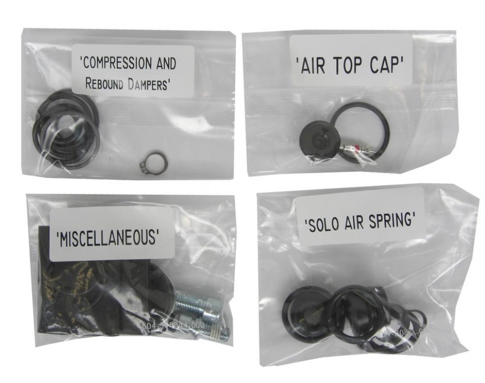 RockShox 2010 Recon Service Kit mit Kompressions- & Rebound-Dämpfern, Air Top Cap und Solo Air Spring Ersatzteilen.