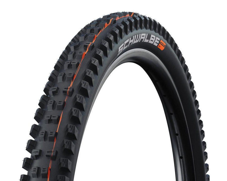 Schwalbe Tacky Chan MTB Reifen 27.5x2.40 Zoll, schwarz mit orangen Laufflächen-Details, Super Gravity Addix Soft.