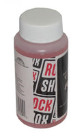 RockShox Hydraulik Fluid Reverb 1 Liter Flasche mit pinker Flüssigkeit für Fahrrad-Fahrwerke.