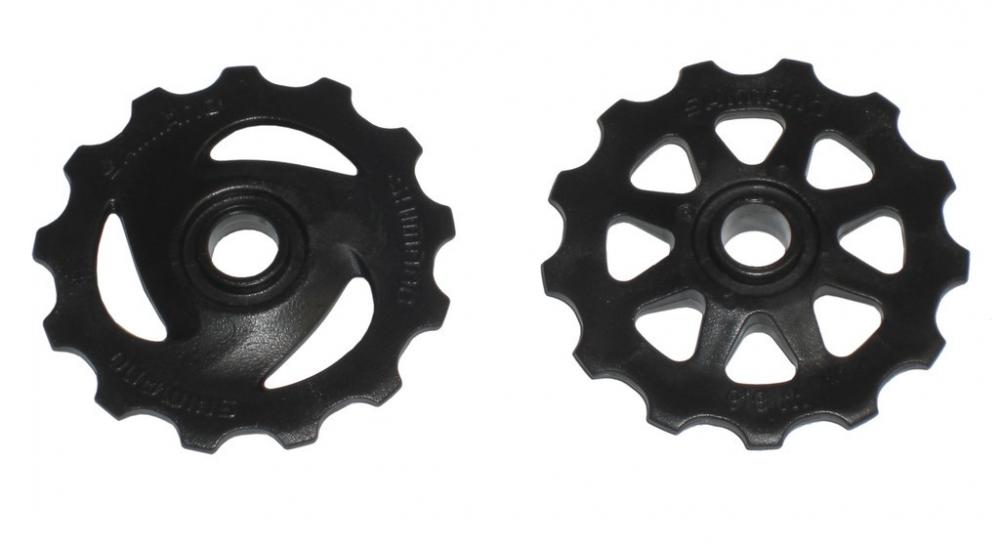 SHIMANO Schaltrollensatz RD-TX35 für Shimano Tourney Schaltwerke, zwei schwarze Schaltrollen.