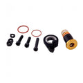 Schraubenset SRAM XX1 Eagle Gold für Schaltwerk: Befestigungs- und Einstellschrauben, O-Ringe und gold-schwarzes Bauteil.