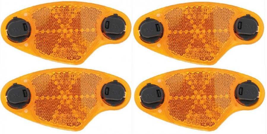 4 orange Busch & Müller Speichenreflektoren 309V, StVZO-zugelassen, mit Kunststoffbefestigung für Fahrradspeichen.