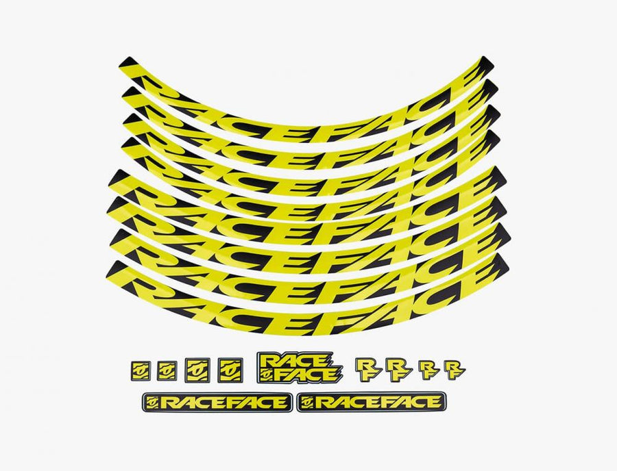 Race Face Laufrad Decal Set in Neongelb für Fahrräder, mit großen und kleinen Aufklebern.