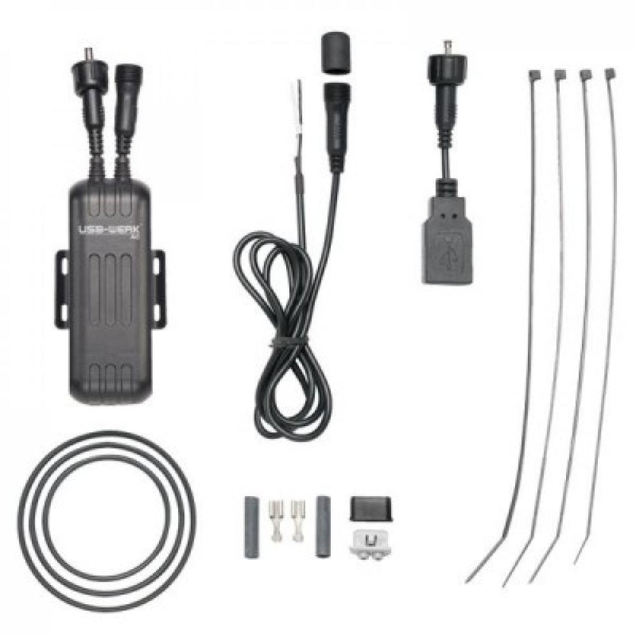 Busch + Müller USB-Werk AC mobiles Ladegerät für Nabendynamo, komplett mit USB-Anschlusskabeln und Befestigungsmaterial.