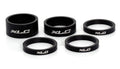 XLC A-Head Spacer-Set AS-A02: Fünf mattschwarze 1 1/8" Fahrrad Spacer in verschiedenen Höhen.