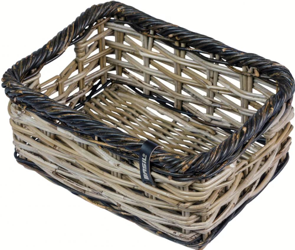Basil Dijon S Vorderradkorb aus grobmaschigem Rattan, grau/schwarz, mit Logo.