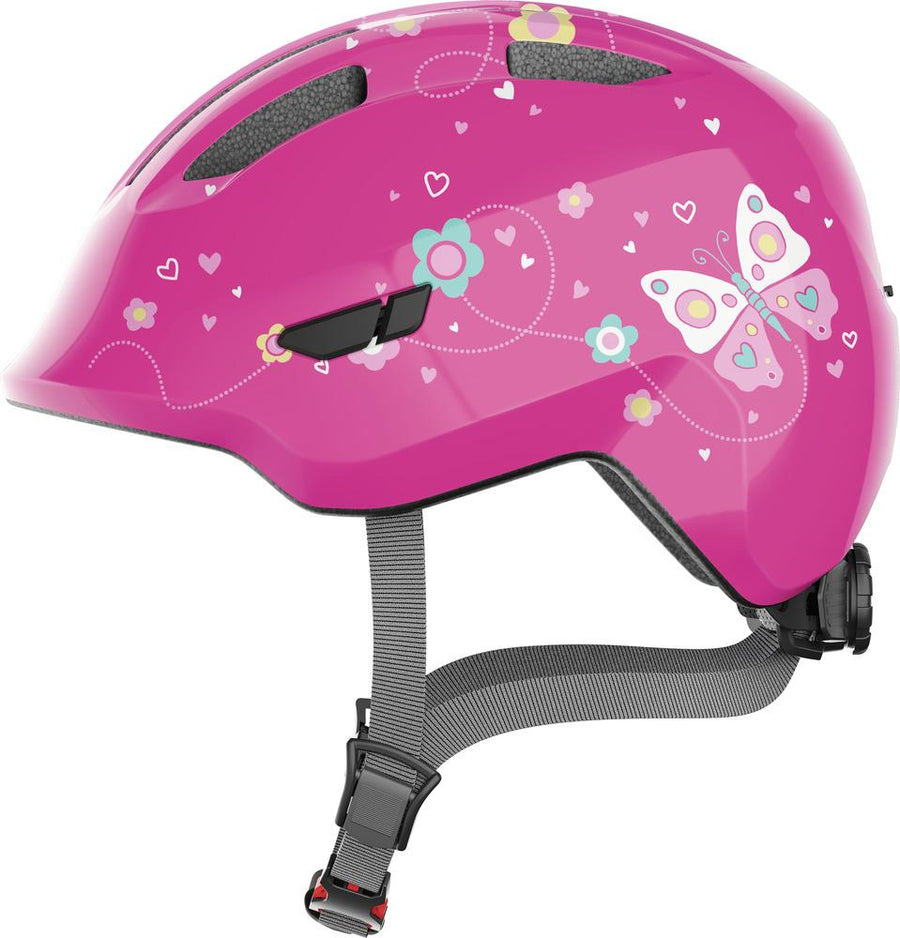 Abus Kinderhelm Smiley 3.0 pink butterfly M 50-55cm mit Schmetterling- und Blumen-Design.
