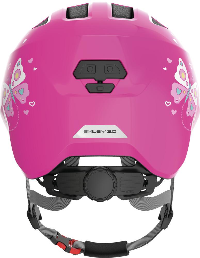 Abus Kinderhelm Smiley 3.0 Pink Butterfly M 50-55cm Rückansicht mit Reflektor und Einstellrad.