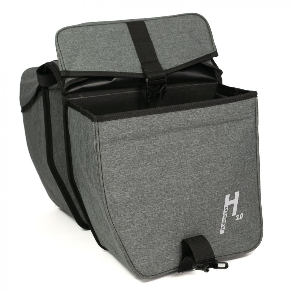 Offene graue Haberland Doppeltasche 3.0 mit schwarzen Riemen und Logo. Flexible Fahrradtasche.