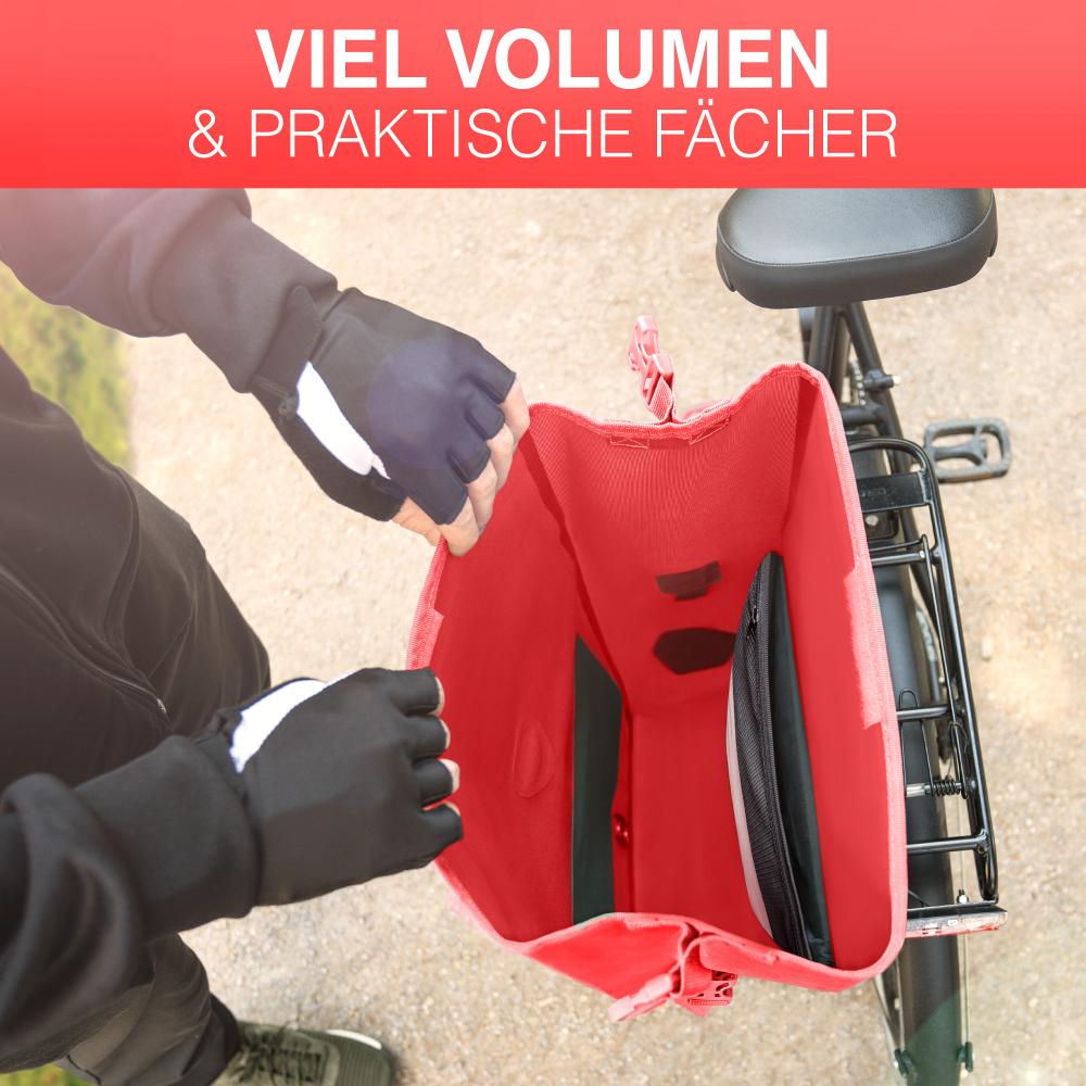 Valkental ValkOcean Gepäckträgertasche Koralle am Fahrrad, geöffnet mit viel Volumen und praktischen Fächern.