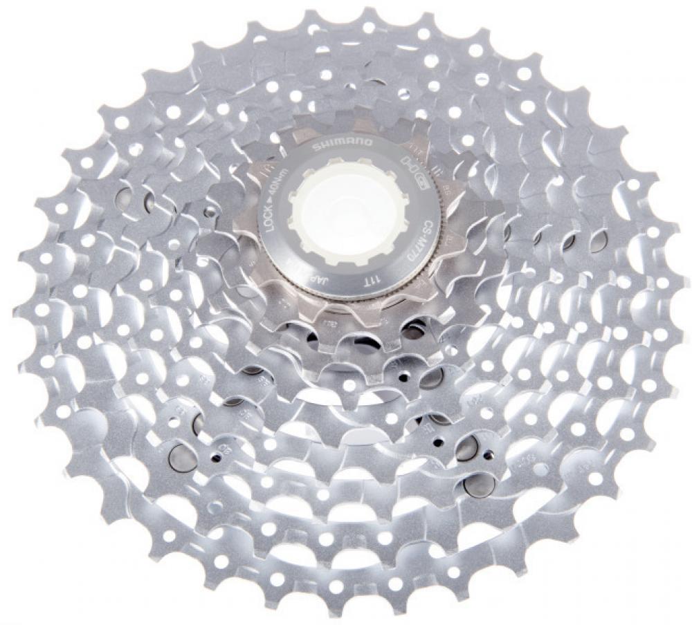 Silberne Shimano Deore XT CS-M770 9-fach Kassette 11-34Z für präzise Schaltperformance auf Trails und am Berg.