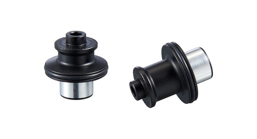 Ritchey WCS HR Disc 148x12mm BOOST Conversion-Service Kit. Zwei schwarze Naben-Endkappen mit silbernen Hülsen.