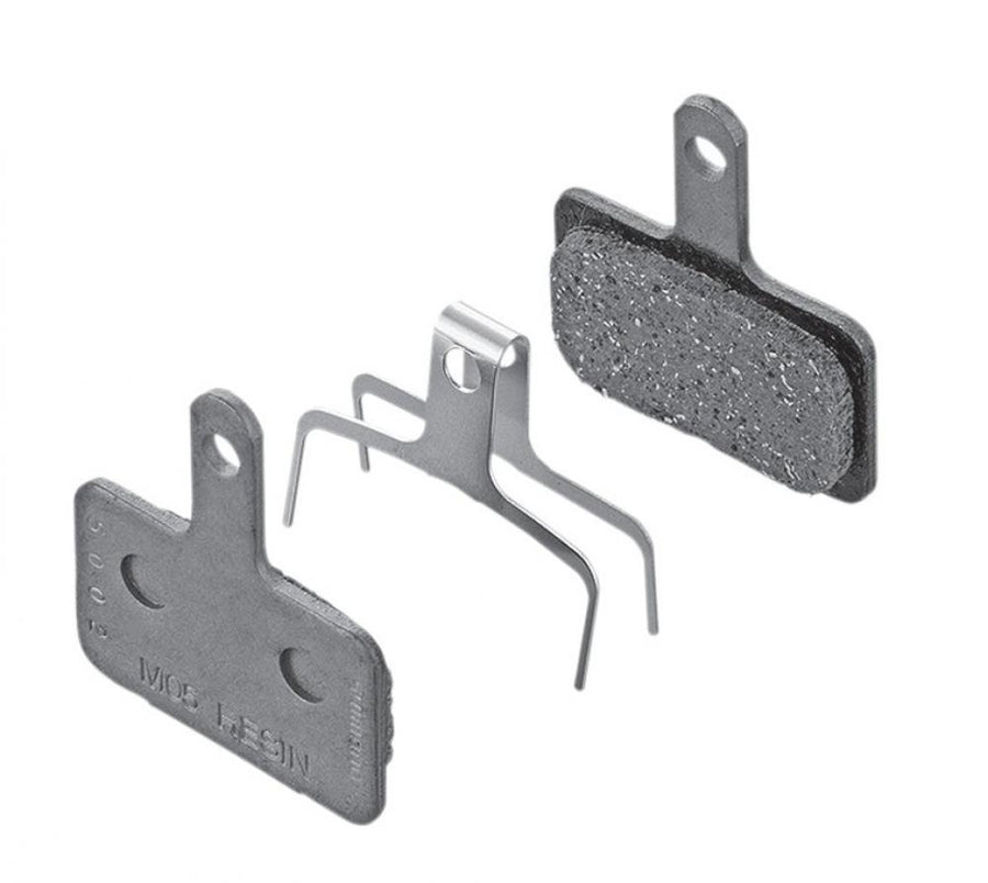 Shimano M05 Resin organische Scheibenbremsbeläge mit Spreizfeder für Shimano BR-M515 und C601 Bremsen.