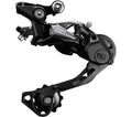 Schwarzes Shimano Deore RD-M6000 GS 10-fach Shadow Plus Schaltwerk für präzises MTB-Schalten.