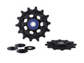 Schwarzes SRAM Eagle 12-fach Schaltrollen-Set (XX1/X01) mit Keramiklagern und Spacern auf weißem Hintergrund.